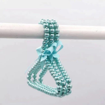 2Pcs Fashion Plastic Pearl Bow Clothes Clothing Hanger Hangers for Kids Children Pet Dog Faux Pearl Bow Clothes Hangers Plastic Pearl Beaded Bow Clothes Dress Coat Hanger