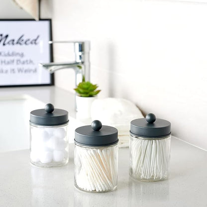 Amolliar 4 Pack Apothecary Jars Bathroom Vanity Storage Organizer Set -Countertop Canister with Stainless Steel Lids &Cute Stickers - Qtip Dispenser Holder for Qtips,Cotton Swabs,Makeup Sponges (Grey)