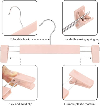 GUANJUNE Clothes Pants Hangers, Space-Saving Skirt Holders with 360 ° Swivel Hooks, Adjustable Clips, Trouser Hangers, Clothes Coat Garment Jeans Hangers (10 Pack, Pink)