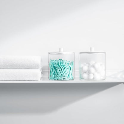 TIPGO Glass Qtip Holder Dispenser - 24 oz Clear Canister Jar, Bathroom Vanity Storage Organizer for Cotton Swabs, Pads, Floss Picks, Small Containers for Makeup Storage (White)