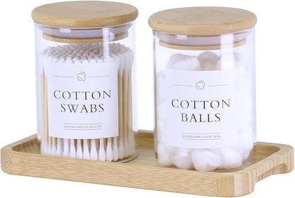INIUNIK Qtip Holder with Vanity Tray - 2 Pack Glass Apothecary Jars with Lids, Cotton Ball Swab Pad Floss Pick Holder, Bathroom Organizers Jars Containers Canisters Accessories Set