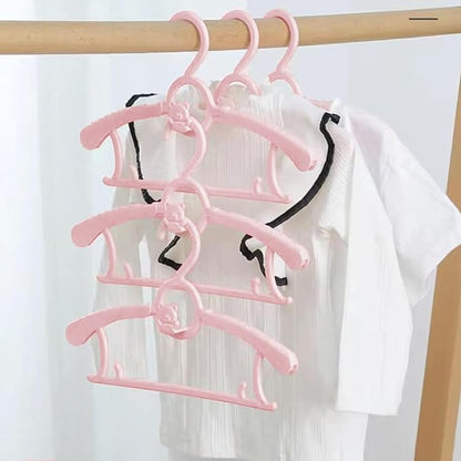 HGYZE Kid Hangers for Closet 50pcs, Pink Baby Clothes Hanger Plastic, 11-14" Adjustable Bulk Perchas for Newborn, Non-Slip Children Outfit Bear Hangar for Girl Boy Toddler Infant Nursery Clothing