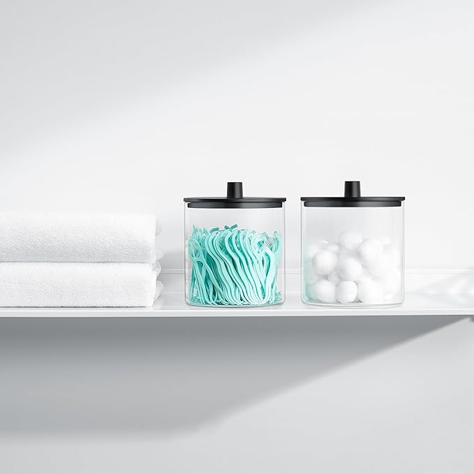TIPGO Glass Qtip Holder Dispenser - 24 oz Clear Canister Jar, Bathroom Vanity Storage Organizer for Cotton Swabs, Pads, Floss Picks, Small Containers for Makeup Storage (Black)