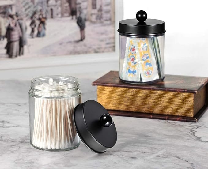 Amolliar Apothecary Jars Bathroom Storage Organizer - Cute Qtip Dispenser Holder Vanity Canister Jar Glass with Lid for Cotton Swabs,Rounds,Bath Salts,Makeup Sponges,Hair Accessories/Black（2 Pack）