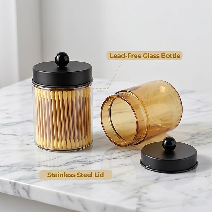 Amolliar 4 Pack Apothecary Jars Bathroom Vanity Storage Organizer Set -Countertop Canister with Stainless Steel Lids &Stickers Qtip Dispenser Holder for Cotton Swab (Amber-black Lid)