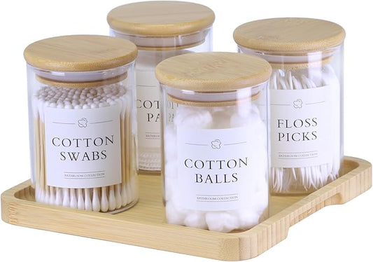 INIUNIK Qtip Holder with Vanity Tray - 4 Pack Glass Apothecary Jars with Lids, Cotton Ball Swab Pad Floss Pick Holder, Bathroom Organizers Jars Containers Canisters Accessories Set