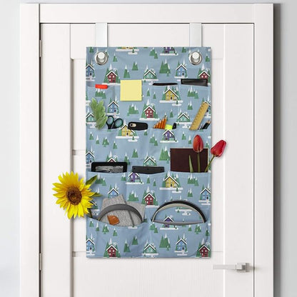 Ambesonne House Hanging Pocket Organizer, Rectangular Trilateral Homes Windows Door Knobs Snow on Pointy Trees Christmas Time, Printed Polyester Storage Bag with Pockets, 21" x 31", Multicolor