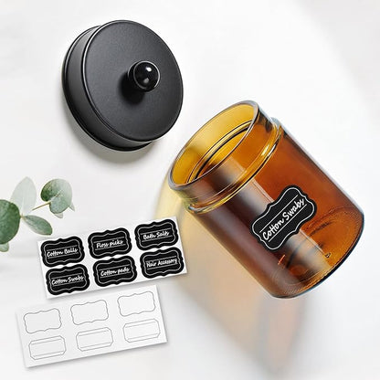 Amolliar Amber Glass Qtip Holder, Apothecary Jars with Matte Black Metal Lid & Stickers-Bathroom Qtip Dispenser Storage Organizer Set,Vanity Counter Canister for Cotton Swabs,Round Pads,Floss (4 Pack)
