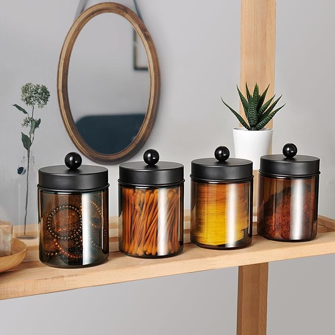Amolliar Amber Glass Qtip Holder, Apothecary Jars with Matte Black Metal Lid & Stickers-Bathroom Qtip Dispenser Storage Organizer Set,Vanity Counter Canister for Cotton Swabs,Round Pads,Floss (4 Pack)