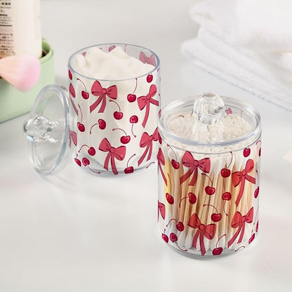 ALAZA 4 Pack Qtip Holder Dispenser Pink Cherry Bow Cotton Ball Cotton Swab Round Pads Floss Clear Bathroom Storage Containers Plastic Apothecary Jars with Lids
