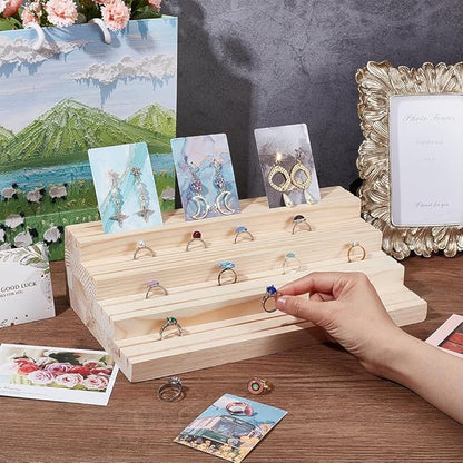 NBEADS 4-Tier Wood Jewelry Display Stand, Wooden Earring Organizer Holder with Grooves Jewelry Showcase Rack for Rings Earring Display Cards Photo Home Decorations