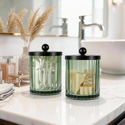Amolliar Sage Green Glass Apothecary Jar, Qtip Holder Dispenser for Cotton Swabs, Balls, Makeup Pads, Floss Picks, Bathroom Essential Accessories, Countertop Canister Storage Organizer (Black, 2 Pack)