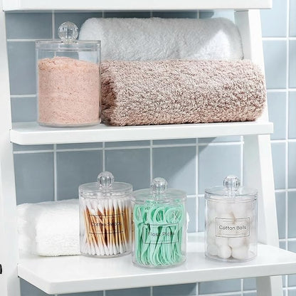 novelinks Acrylic Plastic Qtip Holder Dispenser, Apothecary Jar Canister Set with Lids for Cotton Swabs, Balls, Round Pads & Floss Picks - Bathroom Vanity Makeup Organizer (Clear, 4 Pack)