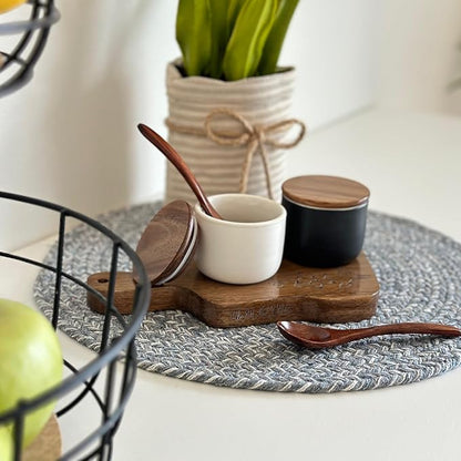 SALT AND PEPPER CELLAR SET WITH ACACIA WOOD LID AND ENGRAVED DECORATIVE HOLDING TRAY - WHITE AND BLACK